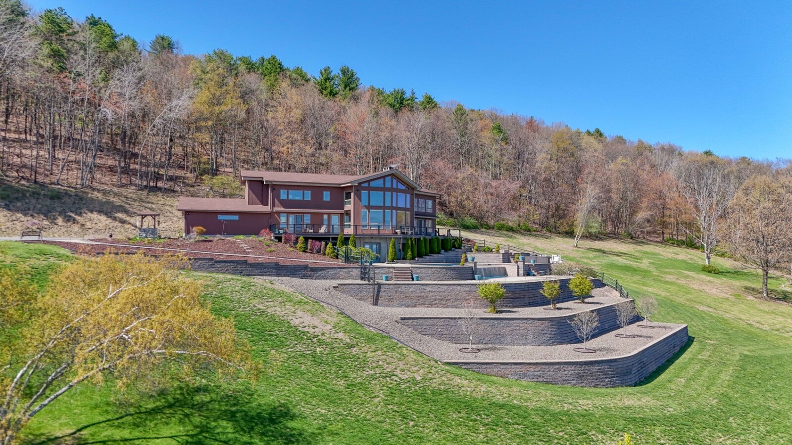 Aerial view of the rolling Hudson Valley landscape around the estate